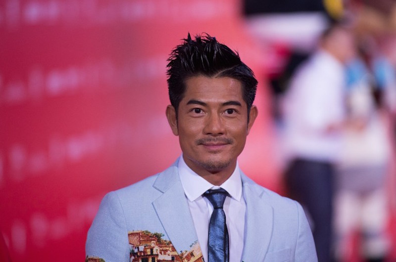 Hong Kong Actor Aaron Kwok poses on the red carpet during the opening ceremony of the Shanghai International Film Festival (SIFF) in Shanghai June 13, 2015. u00e2u20acu201d AFP pic