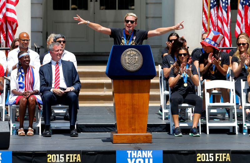 New York City mayor Bill De Blasio and wife Chirlane McCray listen to Abbey Wambach speak at the US Women's World Champions celebration ceremony at the New York City Hall, July 10, 2015.  u00e2u20acu201d Reuters/USA Today Sports pic