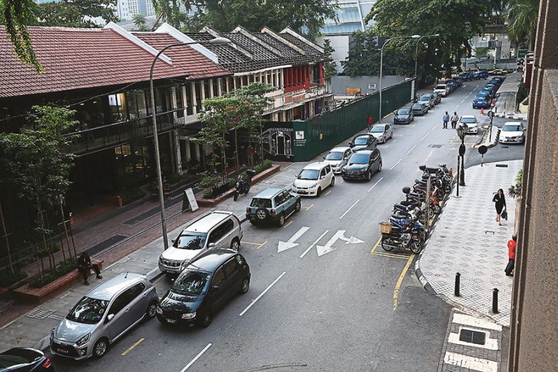 Work is under way on restoring buildings along Jalan Doraisamy. u00e2u20acu201d Picture by Azneal Ishak
