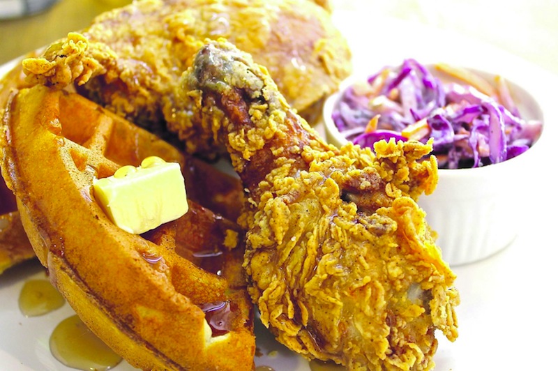 Fried chicken and waffles served with a side of purple cabbage slaw and Chinese pear. u00e2u20acu201d TODAY pic