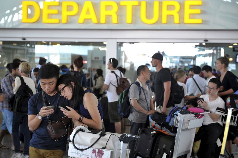 Passengers wait in the international terminal at Ngurah Rai Airport in Bali July 10, 2015 in this photo taken by Antara Foto. u00e2u20acu201d Reuters pic