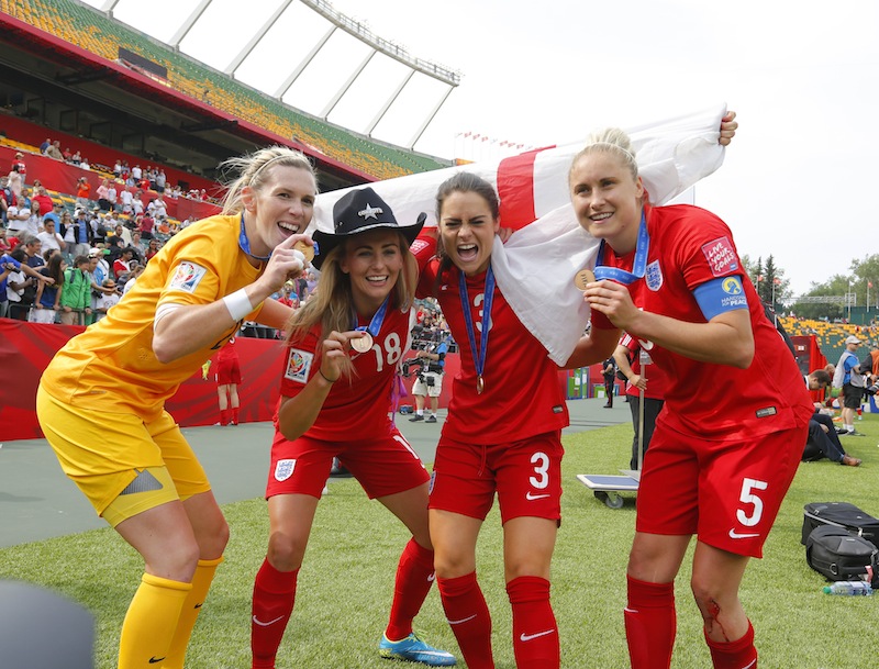 England goalkeeper Carly Telford (21) and forward Toni Duggan (18) and defender Claire Rafferty (3) and defender Steph Houghton (5)  display their medals after defeating Germany in the third place match of the FIFA 2015 Women's World Cup. u00e2u20acu201du00c2u00a0Reuters pic