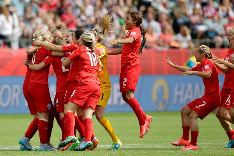 England celebrate their victory over Germany  in the third place match of the Women's World Cup in Edmonton, July 4, 2015.  u00e2u20acu201d Reuters pic