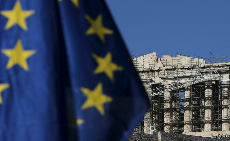 The European Union flag flutters as the ancient Parthenon temple is seen in the background in Athens, Greece, July 4, 2015. Greeceu00e2u20acu2122s finance minister accused creditors of trying to u00e2u20acu02dcterroriseu00e2u20acu2122 Greeks into accepting austerity. u00e2u20acu201d Reuters pic