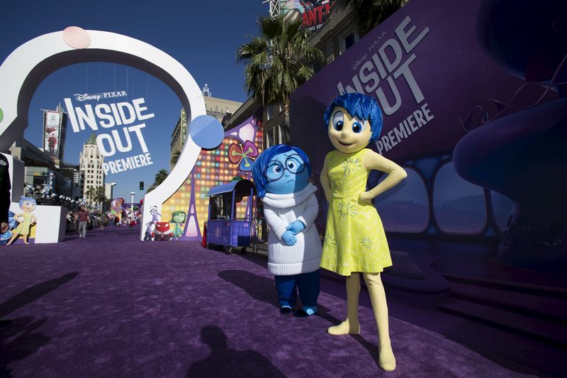 'Joy' and 'Sadness,' characters of the animation film 'Inside Out,' at its premiere at El Capitan theatre in Hollywood, California June 8, 2015. u00e2u20acu201d Reuters pic