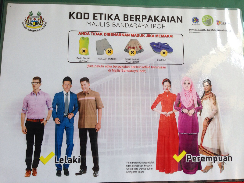 A poster showing the dress code implemented by the Ipoh City Council. u00e2u20acu201d Picture by Melissa Chi