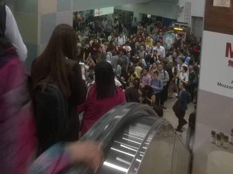 The congestion at the KLCC train station due to the slowdown of the Kelana Jaya LRT rail service, July 27, 2015. u00e2u20acu201d Picture by Ungku Nur Natasya