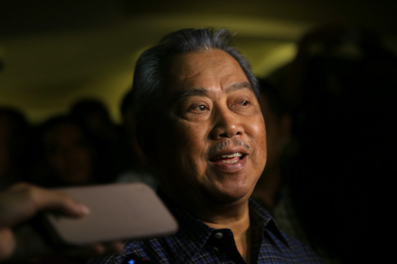 Tan Sri Muhyiddin Yassin speaks to reporters at his house in Bukit Damansara, July 28, 2015. u00e2u20acu201d Picture by Saw Siow Feng