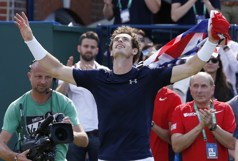 Great Britain's Andy Murray celebrates after winning his match during the Davis Cup World Group quarter-final. u00e2u20acu201d Reuters pic