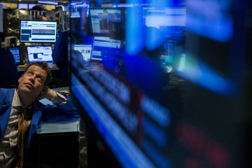 A trader watches a screen while waiting to see what has happened on the floor of the New York Stock Exchange following a halt in trading in New York, July 9, 2015. u00e2u20acu201d Reuters picn