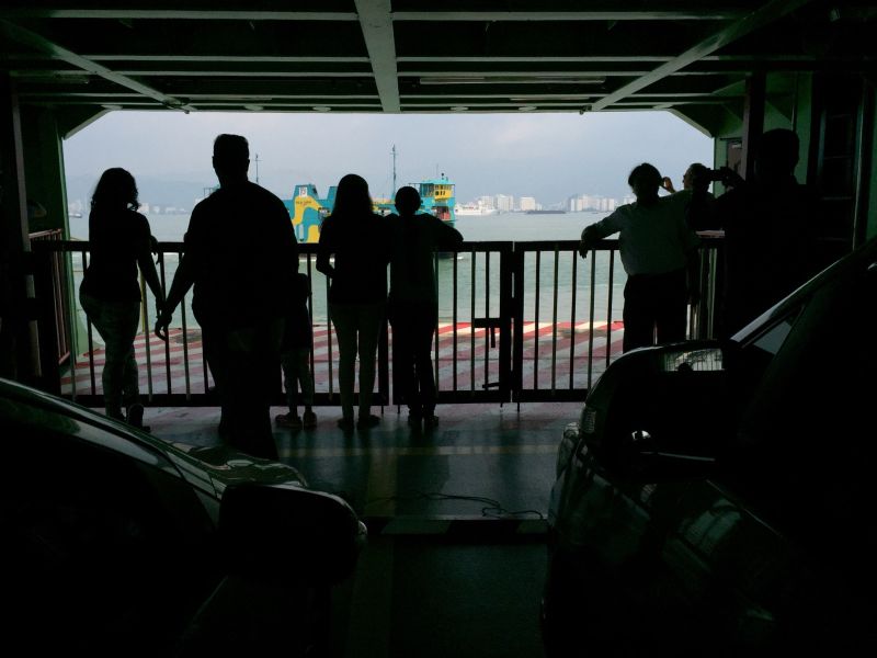 People enjoying the sea view as they travel by ferry to reach Penang island for the upcoming Hari Raya holidays, July 16, 2015. u00e2u20acu2022 Picture by K. E. Ooi