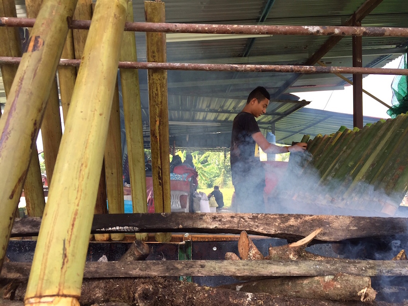 A man preparing some lemang for sale in Taiping, Perak, July 15, 2015. u00e2u20acu201d Picture by K. E. Ooin
