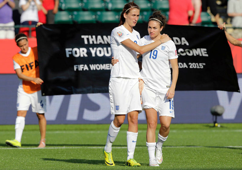 England forward Jill Scott (8) and forward Jodie Taylor (19) react after losing to Japan in the semifinals of the 2015 Women's World Cup at Commonwealth Stadium, Edmonton, July 1, 2015. u00e2u20acu201d Erich Schlegel-USA TODAY Sports/Reuters pic