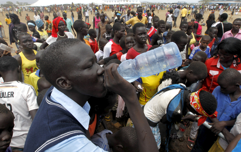 A refugee from South Sudan drinks water at a well during celebrations to mark World Refugee Day at the Kakuma refugee camp in Turkana District, northwest of Kenya's capital Nairobi, June 20, 2015. u00e2u20acu201d Reuters pic