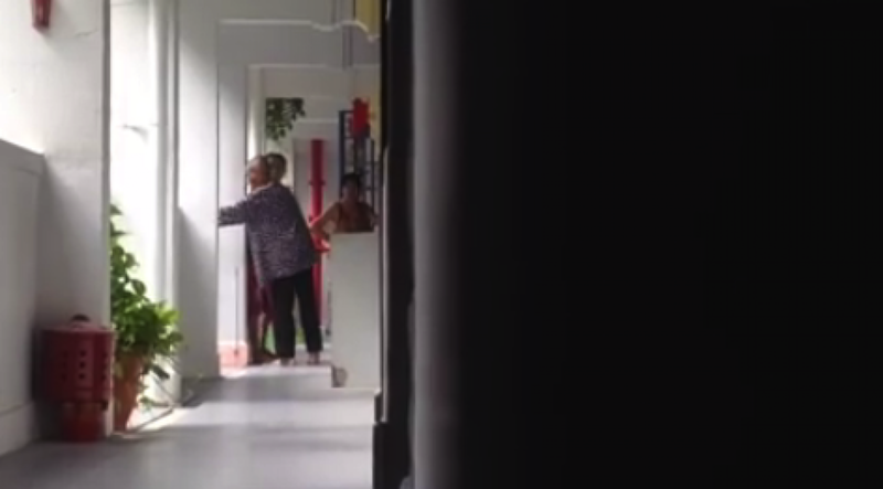 A screencapture from a video shared by Facebook user ApohTecky Numero of an elderly woman being hit by a younger woman.u00c2u00a0u00e2u20acu201d TODAY pic