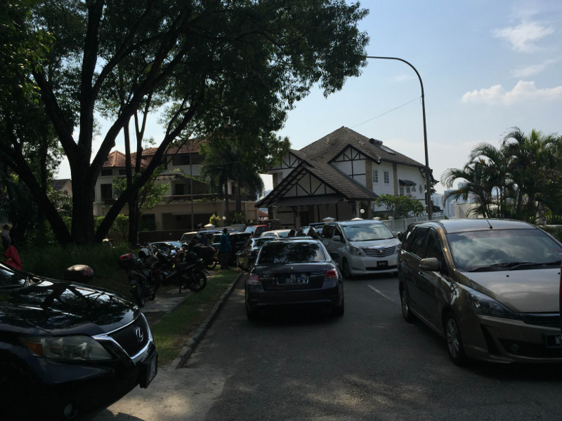 Supporters of Tan Sri Muhyiddin Yassin are seen in various vehicles outside his house in Bukit Damansara, July 28, 2015. u00e2u20acu201d Picture by Kamles Kumar