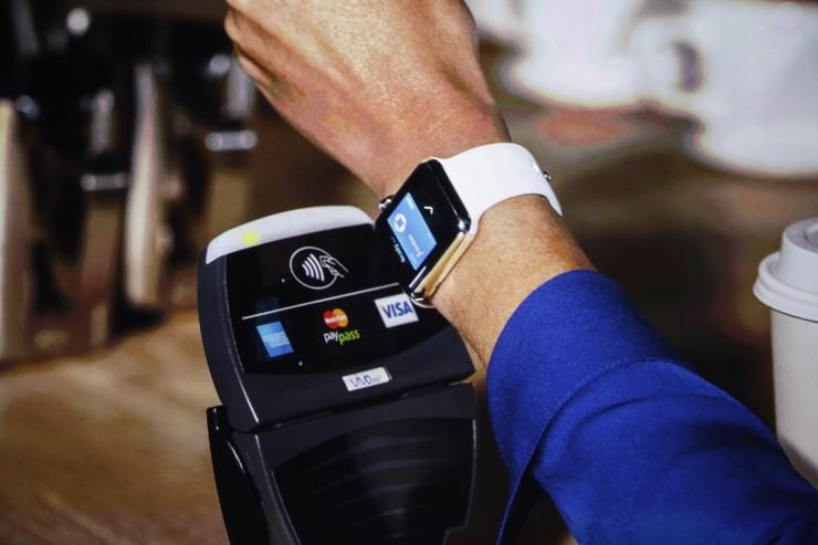 Apple Pay UK launch July 14, 2015. Canadians may be able to use Apple Pay as soon as fall 2015. Reuters file pic