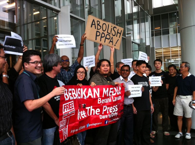 Some 200 people rally at The Edge's office on July 31, 2015, against the suspension of The Edge Weekly and The Edge Financial Daily. u00e2u20acu2022 Picture by Boo Su-Lyn