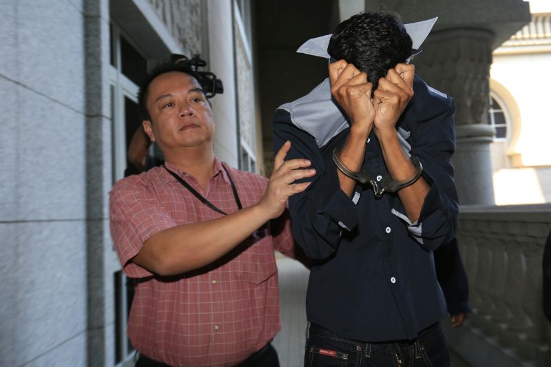 The third suspect (right) to be arrested over the 1MDB scandal has been remanded for four days. u00e2u20acu2022 Picture by Saw Siow Feng