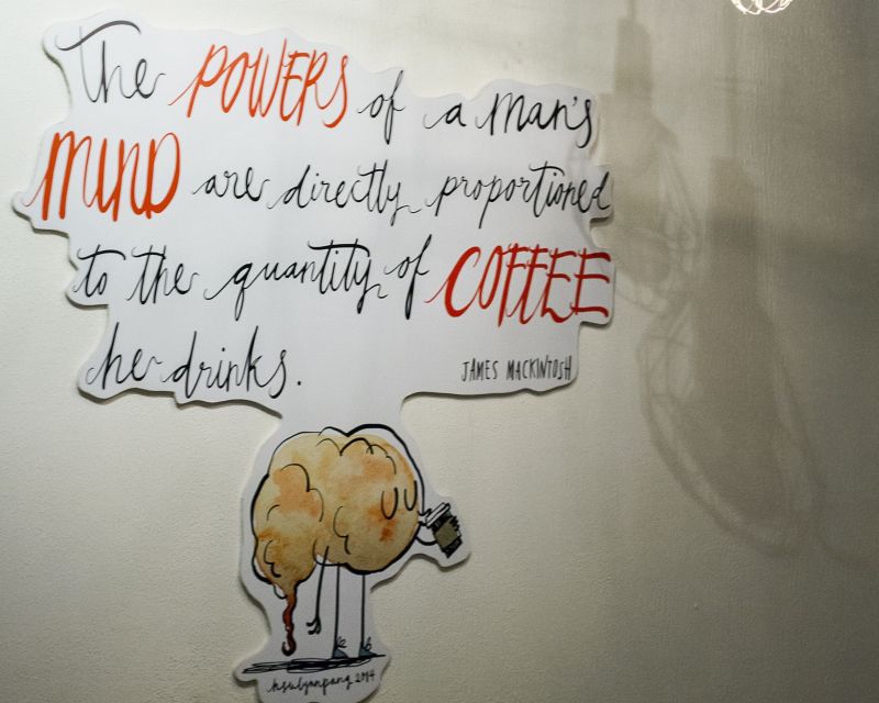 A mural by illustrator Hsulynn Pang celebrates a coffee quote by Scottish politician Sir James Mackintosh.