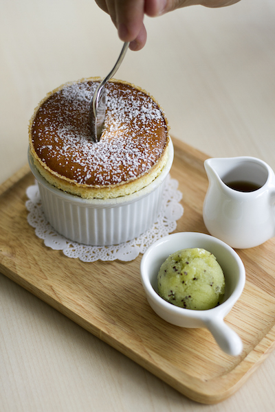 Wild Sheep Chase's signature soufflé made with kampung eggs and real vanilla, served with an orange-infused syrup and home-made sorbet.