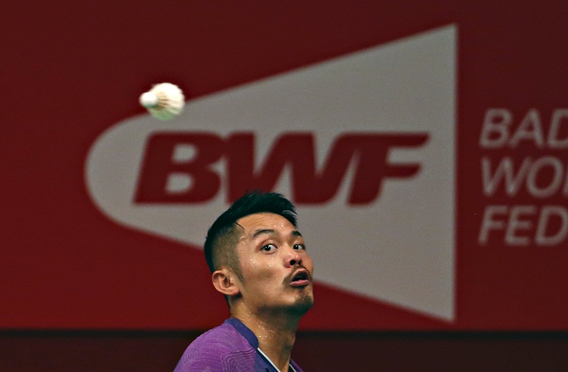 China's Lin Dan hits a return to United States' Sattawat Pongnairat during their men's singles badminton match at the BWF World Championship in Jakarta, August 11, 2015. u00e2u20acu201d Reuters pic