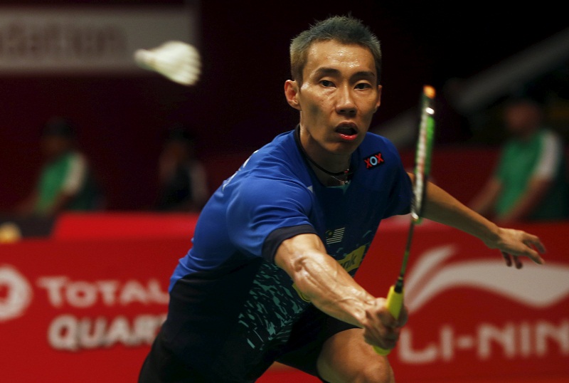 Datuk Lee Chong Wei hits a return to Lithuaniau00e2u20acu02dcs Kestutis Navickas during their menu00e2u20acu2122s singles badminton match at the BWF World Championship in Jakarta, August 11, 2015. u00e2u20acu201d Reuters picn