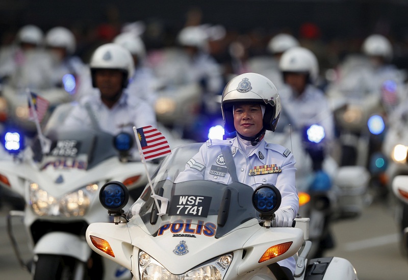 Members of the police take part in National Day celebrations in Kuala Lumpur, August 31, 2015. u00e2u20acu201d Reuters pic
