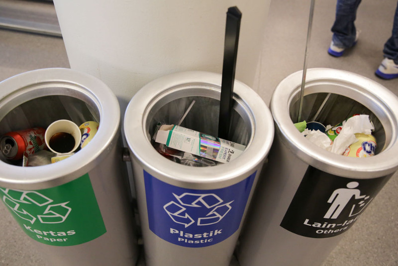 Recycling bins in Ikea with mixed trash in the bins. — Picture by Choo Choy May
