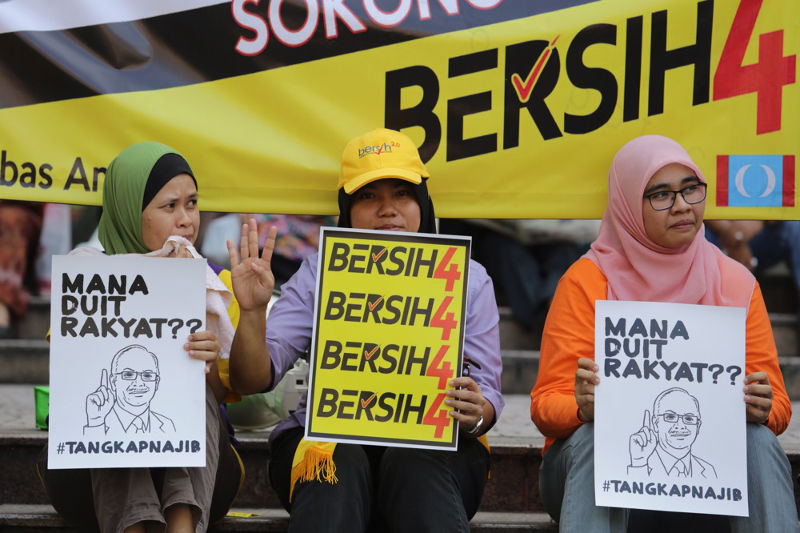 Bersih supporters holding banners promoting the Bersih 4 rally, outside Sogo, in Kuala Lumpur, August 28, 2015. u00e2u20acu201d Picture by Choo Choy May