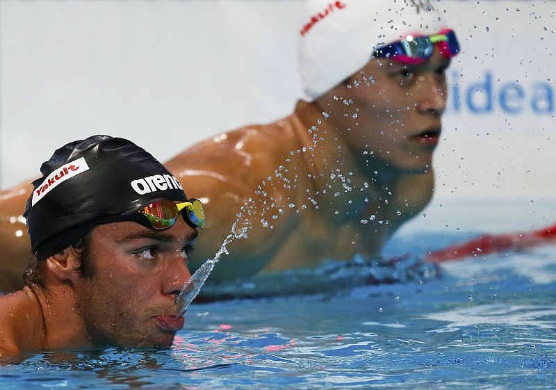 Gregorio Paltrinieri of Italy and Sun Yang (right) of China look at their score after the men's 1500m freestyle heats at the Aquatics World Championships in Kazan, Russia, August 8, 2015. u00e2u20acu201d Reuters pic