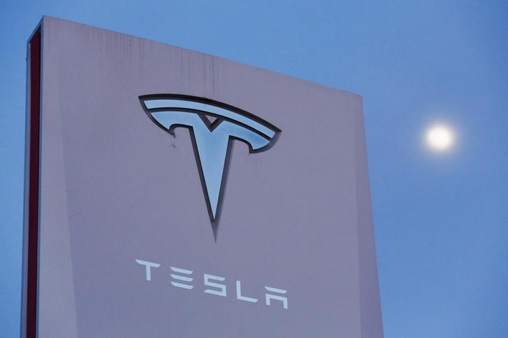 Signage is displayed outside of Tesla Motors before the Tesla Energy Powerwall Home Battery event in Hawthorne, California April 30, 2015. u00e2u20acu201d Reuters pic