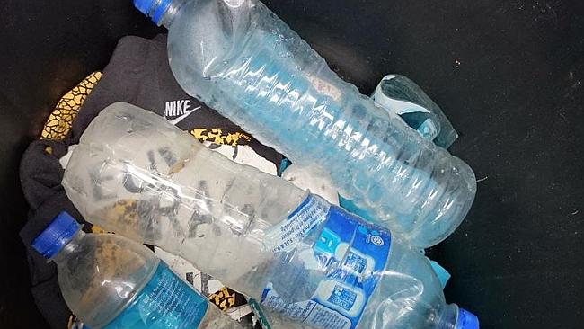Water bottles at Reunion Island linked to MH370.u00c2u00a0u00e2u20acu201d Picture taken from Philippe Creissen's Twitter account