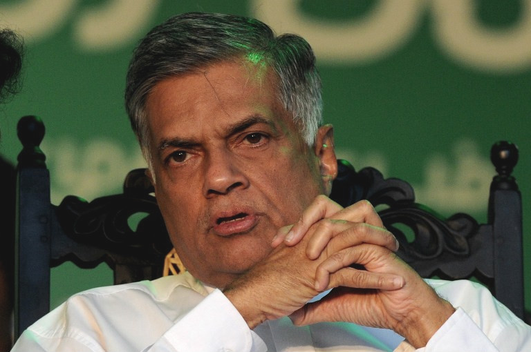 File picture shows Sri Lanka's Prime Minister Ranil Wickremesinghe looking on during an election rally in the central town of Kandy on July 14, 2015. u00e2u20acu201d AFP pic