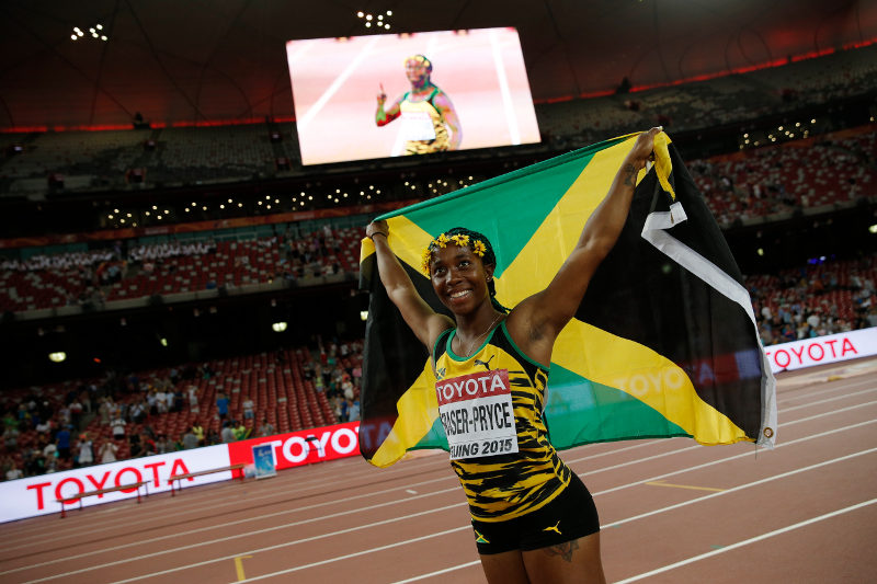 Jamaicau00e2u20acu2122s Shelly-Ann Fraser-Pryce celebrates winning the final of the womenu00e2u20acu2122s 100 metres athletics event at the 2015 IAAF World Championships at the u00e2u20acu02dcBirdu00e2u20acu2122s Nestu00e2u20acu2122 National Stadium in Beijing on August 24, 2015. u00e2u20acu201d AFP pic
