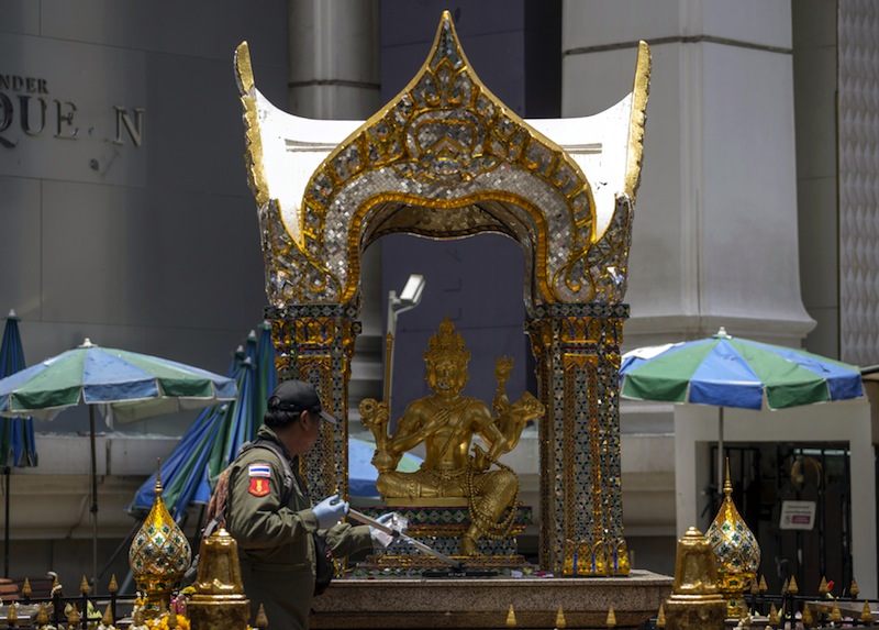An expert cleans an altar with a statue of Hindu god Brahma at the Erawan shrine, the site of a deadly blast, in central Bangkok, Thailand, August 18, 2015.u00c2u00a0u00e2u20acu201d Reuters pic