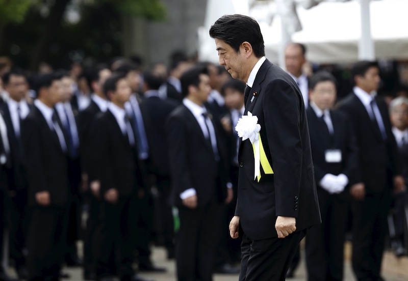 Japan's Prime Minister Shinzo Abe attends a ceremony commemorating the 70th anniversary of  the 1945 atomic bombing of the city, at Nagasaki's Peace Park in Nagasaki, western Japan, August 9, 2015. — Reuters pic