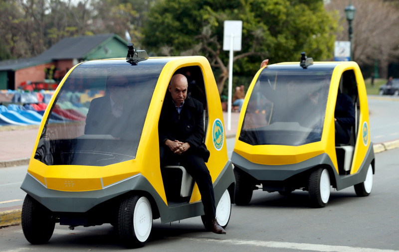 Horacio Rodriguez Larreta, current cabinet chief of Buenos Aires' City government and Mayor-elect, descends form a prototype autonomous electric vehicle during its presentation in Buenos Aires, August 19, 2015. u00e2u20acu201d Reuters pic