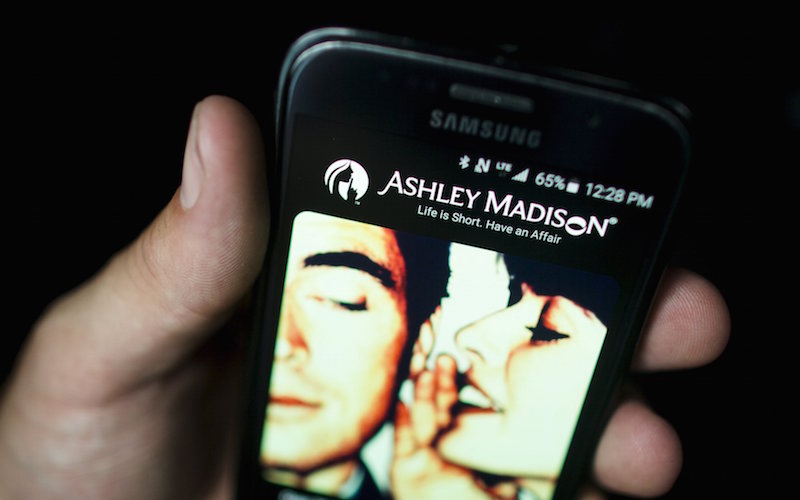 A photo illustration shows the Ashley Madison app displayed on a smartphone in Toronto, August 20, 2015. u00e2u20acu201d Reuters pic