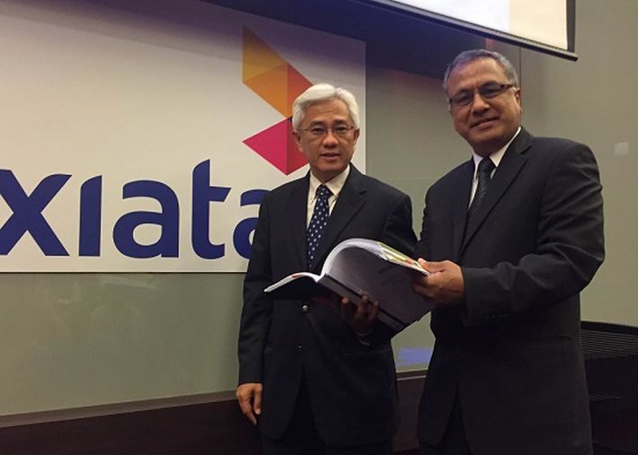 Telling it like it is: Axiata Group president and CEO Jamaludin Ibrahim (left) and CFO Chari TVT. u00e2u20acu201d Reuters pic