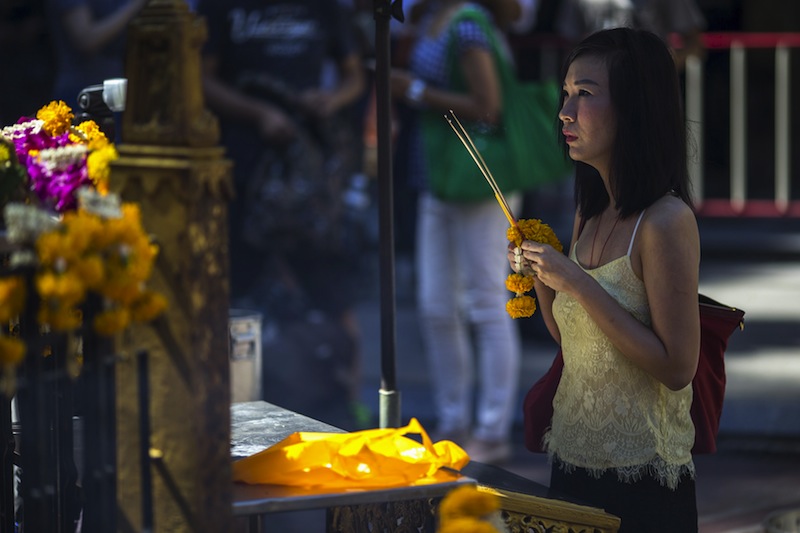 A woman pays her respects at the Erawan shrine, the site of Monday's deadly blast, in central Bangkok, Thailand, August 19, 2015.u00c2u00a0u00e2u20acu201d Reuters pic