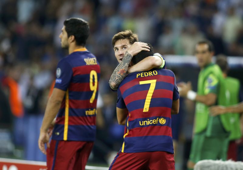 Barcelona's Pedro Rodriguez (front) celebrates a goal with his teammate Lionel Messi during their UEFA Super Cup match in Tbilisi, Georgia, August 12, 2015. u00e2u20acu2022 Reuters pic 