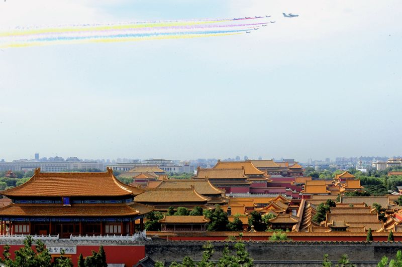 Aircraft fly over the Forbidden City as they perform during a rehearsal for a military parade in Beijing August 23, 2015. u00e2u20acu201d Reuters pic