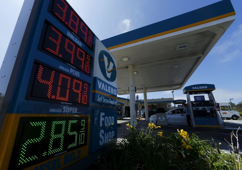 The current price of gasoline shown on a gas station sign in Encinitas, California August 4, 2015. Oil prices snap a three-day losing streak on August 10, 2105. u00e2u20acu201d Reuters pic 