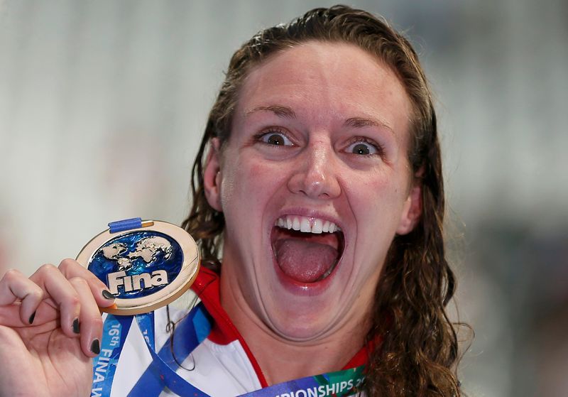 Katinka Hosszu of Hungary shows her gold medal for the women's 200m individual medley at the Aquatics World Championships in Kazan, Russia August 3, 2015. u00e2u20acu201d AFP pic