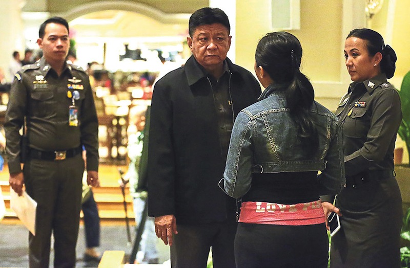 Prawut (second left) speaks to a member of the press when met in a hotel in Bangkok. u00e2u20acu201d Picture by Zuraneeza Zulkifli