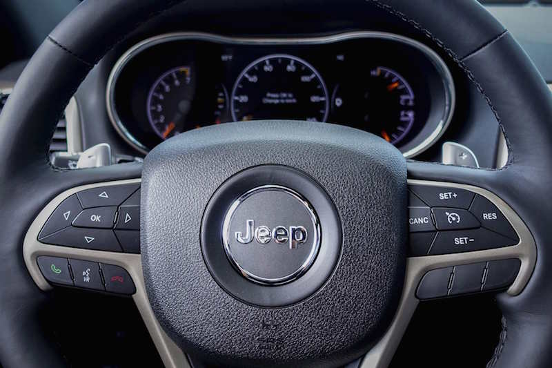 The logo of Jeep is seen on a steering wheel of the 2015 Jeep Grand Cherokee on a car dealership in New Jersey, in this July 24, 2015 file photo. u00e2u20acu201d Reuters pic