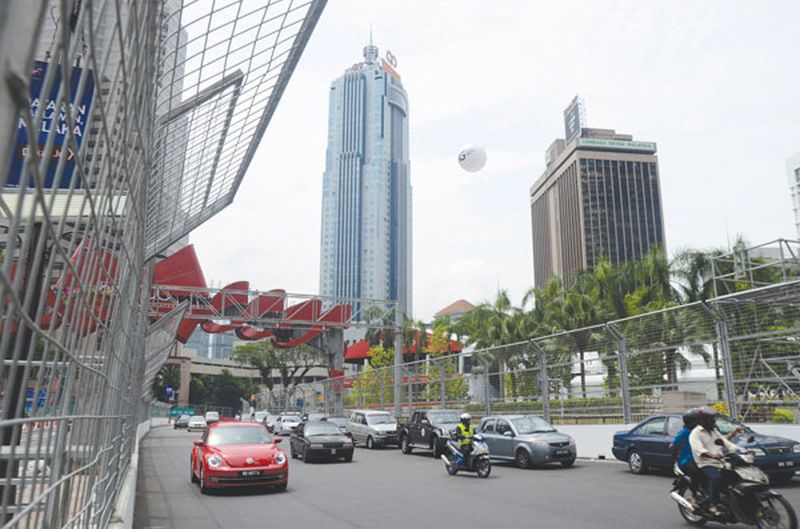 Smooth traffic flow in Jalan P. Ramlee as final preparations take place before the KL City Grand Prix.  Five major roads will be closed from today for the race. u00e2u20acu201d Picture by Adib Ramli