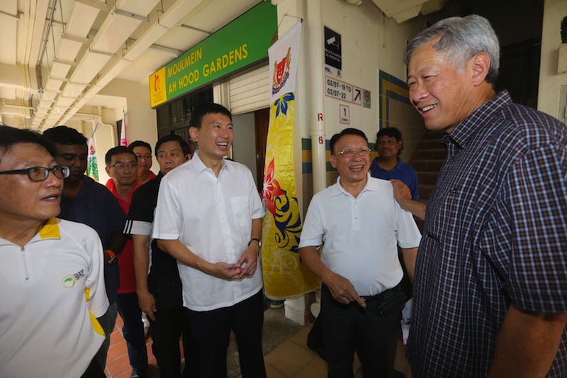 Defence Minister and MP for Bishan-Toa Payoh Ng Eng Hen prepares for house visits with Chee Hong Tat at Blk 106, Jalan Dusun on 10 Aug 2015. u00e2u20acu201d TODAY pic
