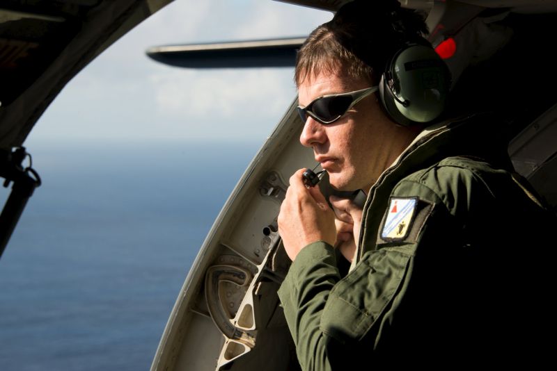 A French military transport crew member inspects the Indian Ocean during a search mission along the coast on the French island of Reunion. u00e2u20acu2022 Reuters pic